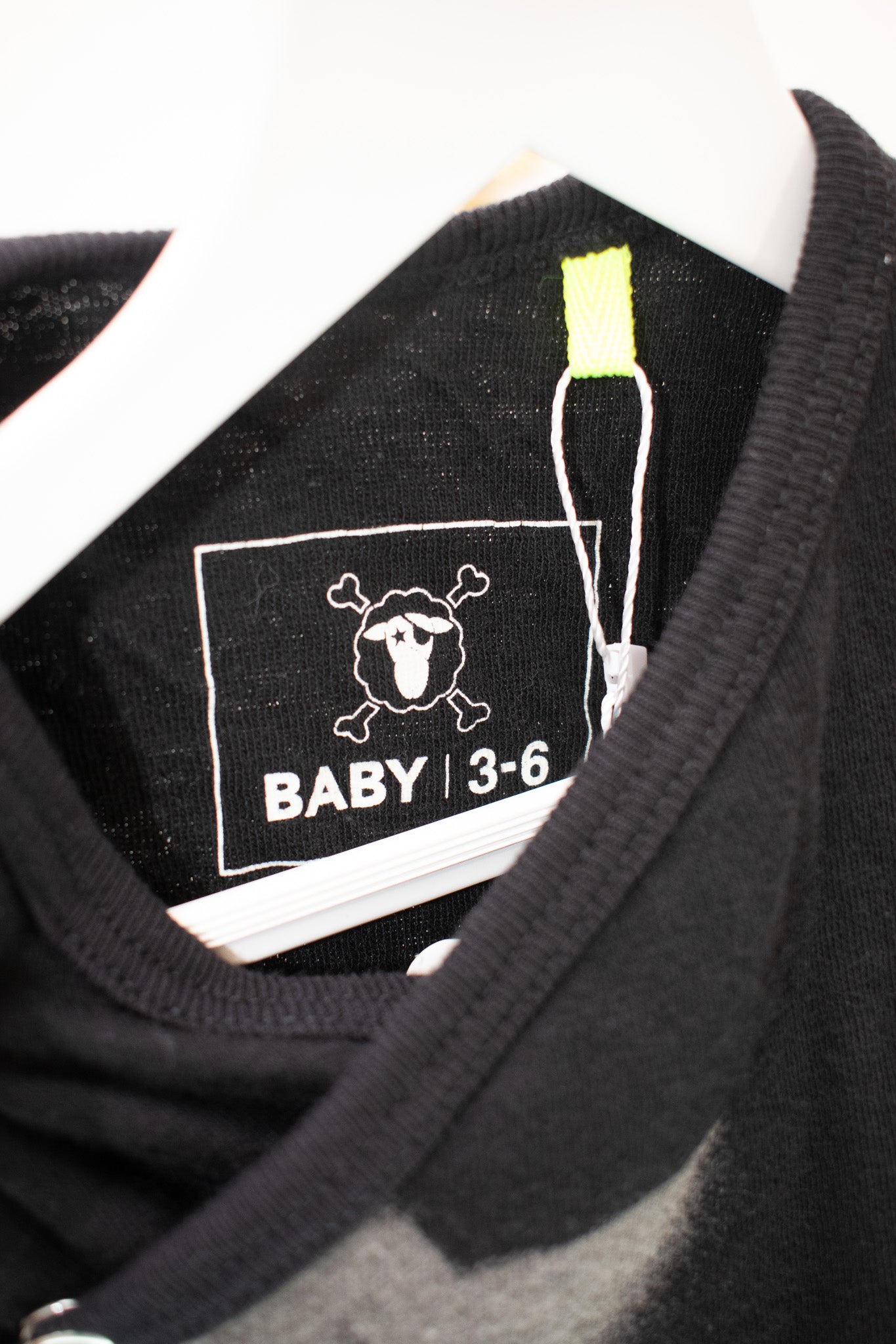 Nununu Black Star Onesie / 3-6 months