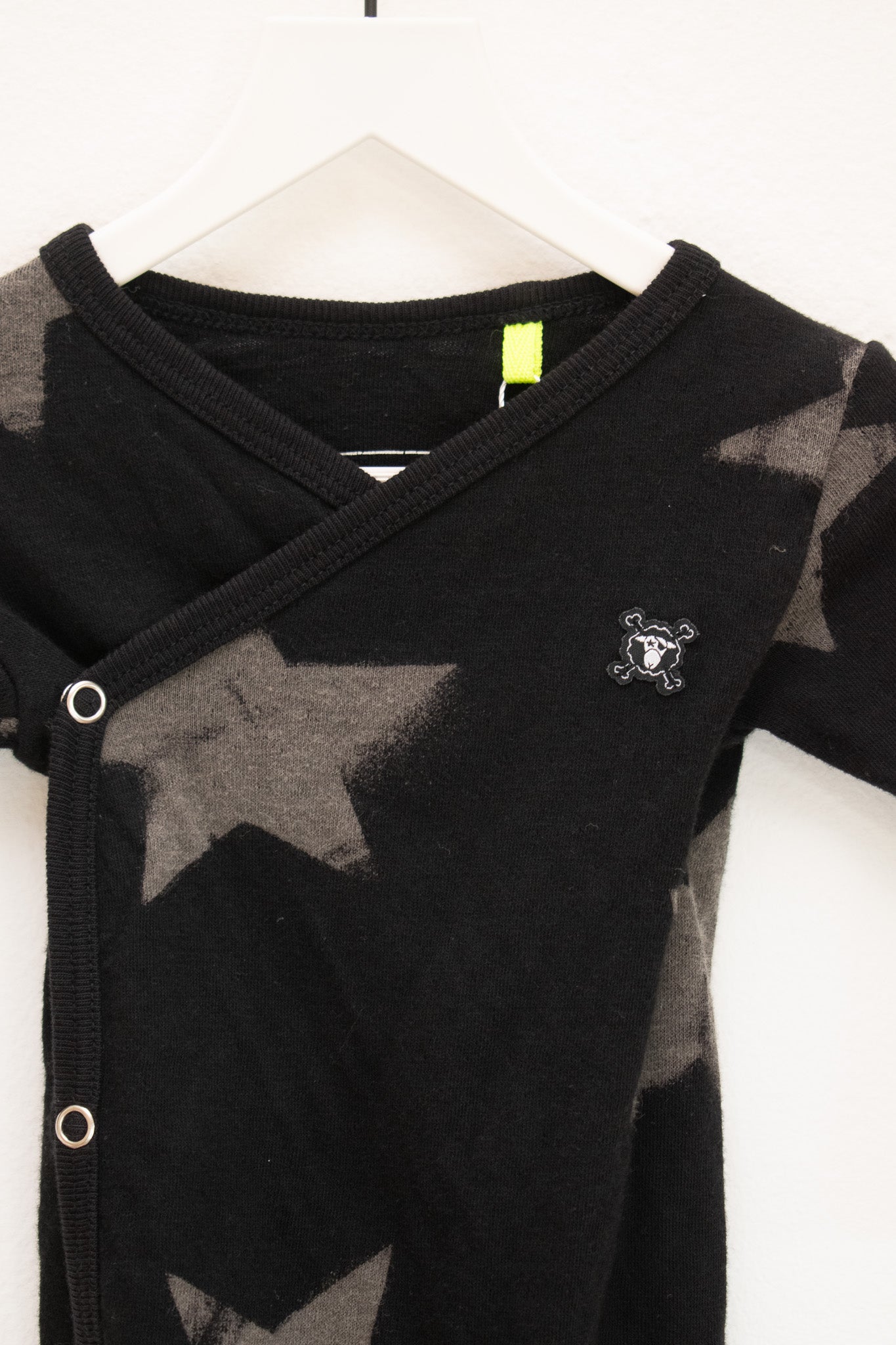 Nununu Black Star Onesie / 3-6 months
