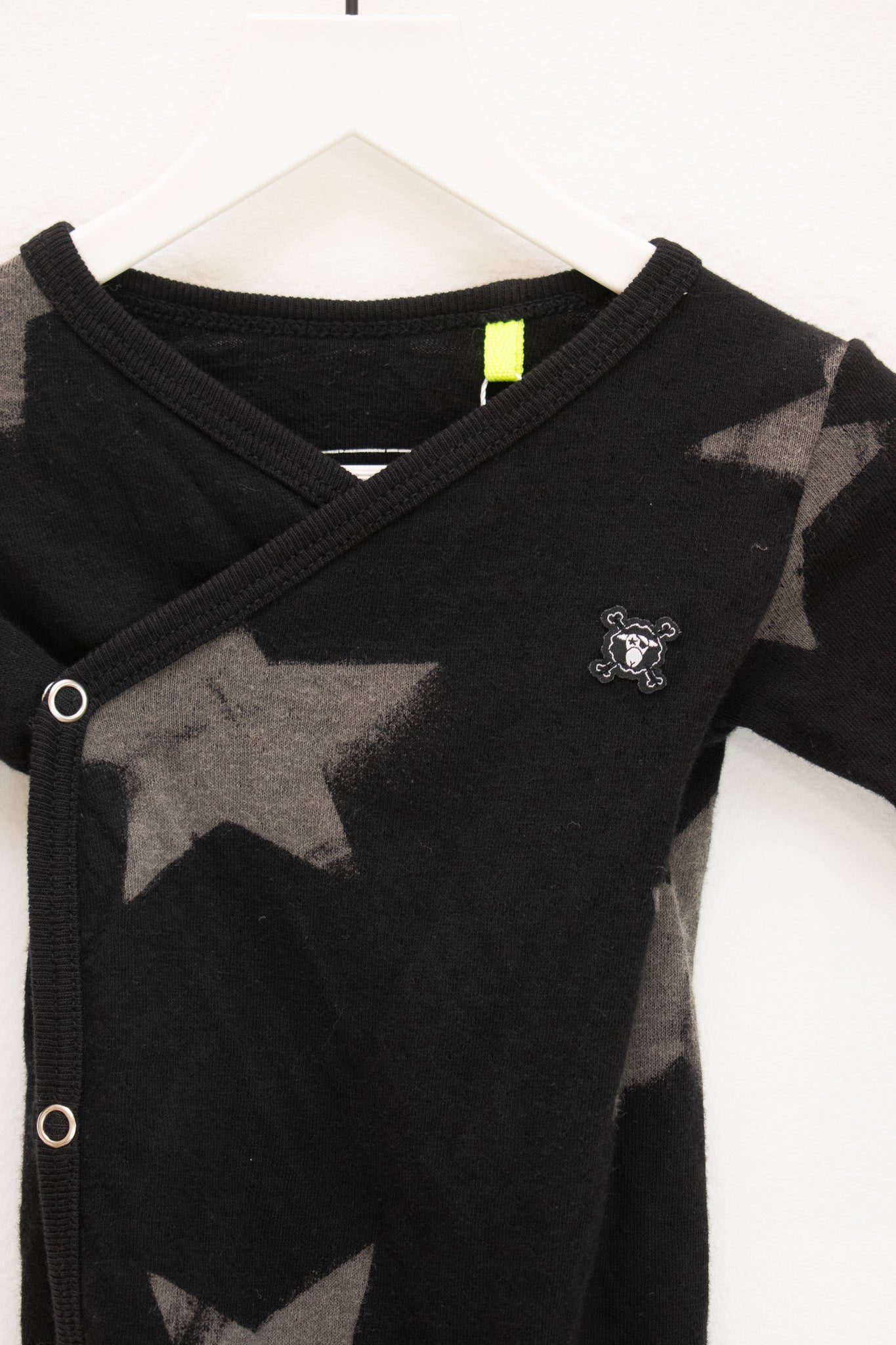 Nununu Black Star Onesie / 3-6 months