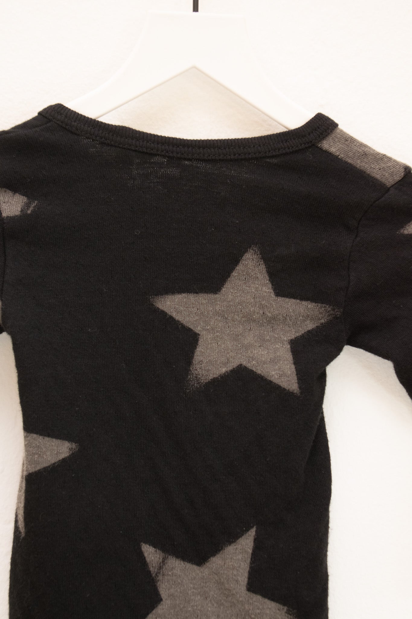 Nununu Black Star Onesie / 3-6 months
