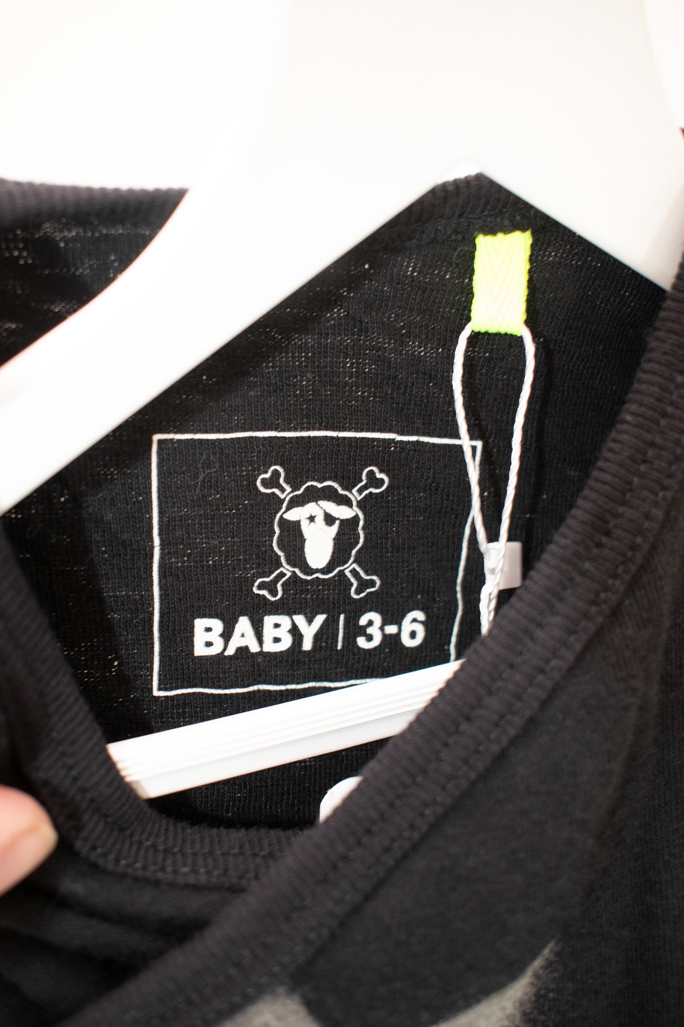Nununu Black Star Onesie / 3-6 months